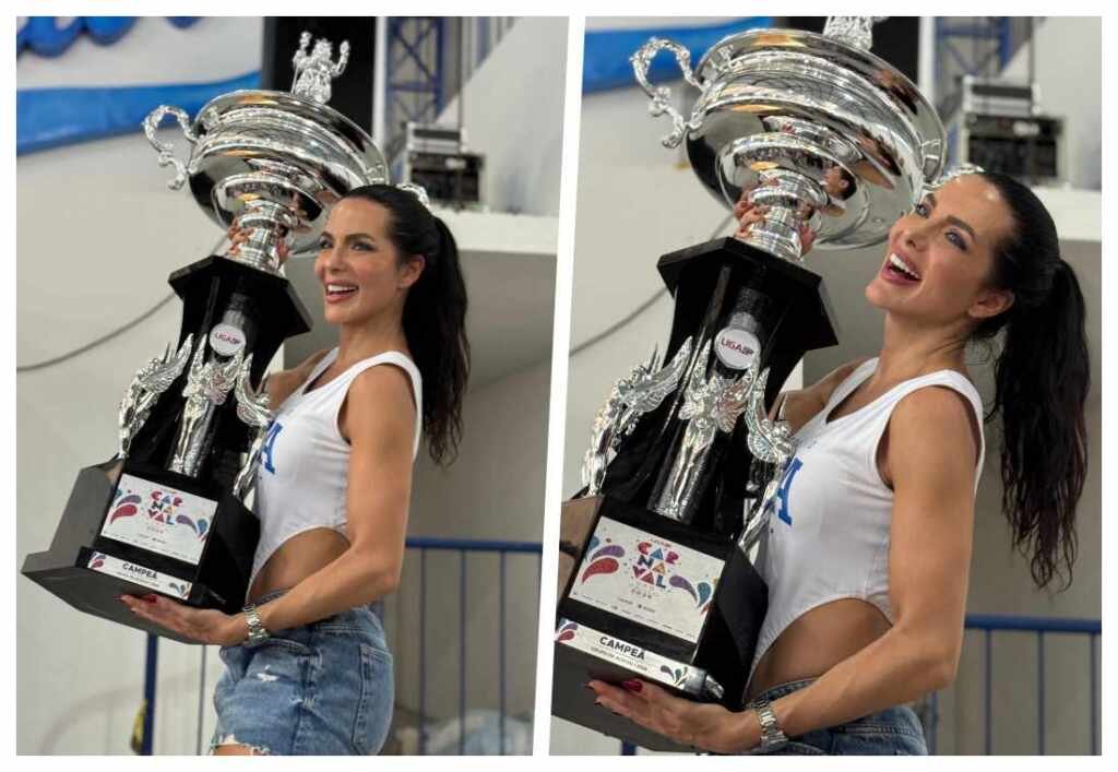 Rainha de bateria Carla Prata comemora campeonato do Tucuruvi com troféu na quadra Carla Prata - Crédito da Foto: Renato Cipriano - Divulgação